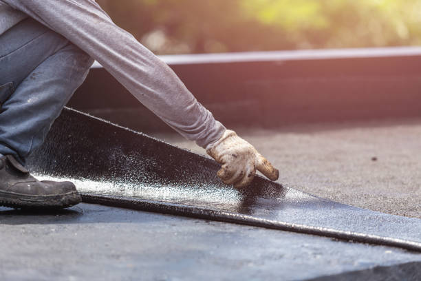 Professional Basement Waterproofing technician working in Kenton, OH